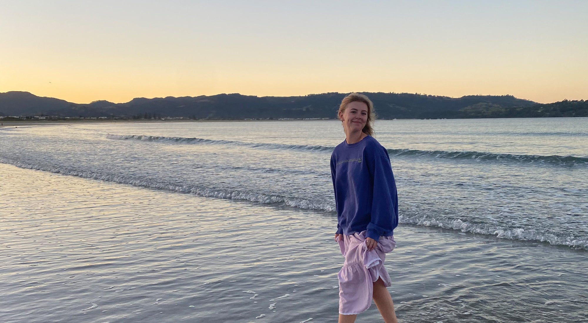 Stella Claire at a New Zealand beach, ethical and sustainable slow fashion label made in New Zealand