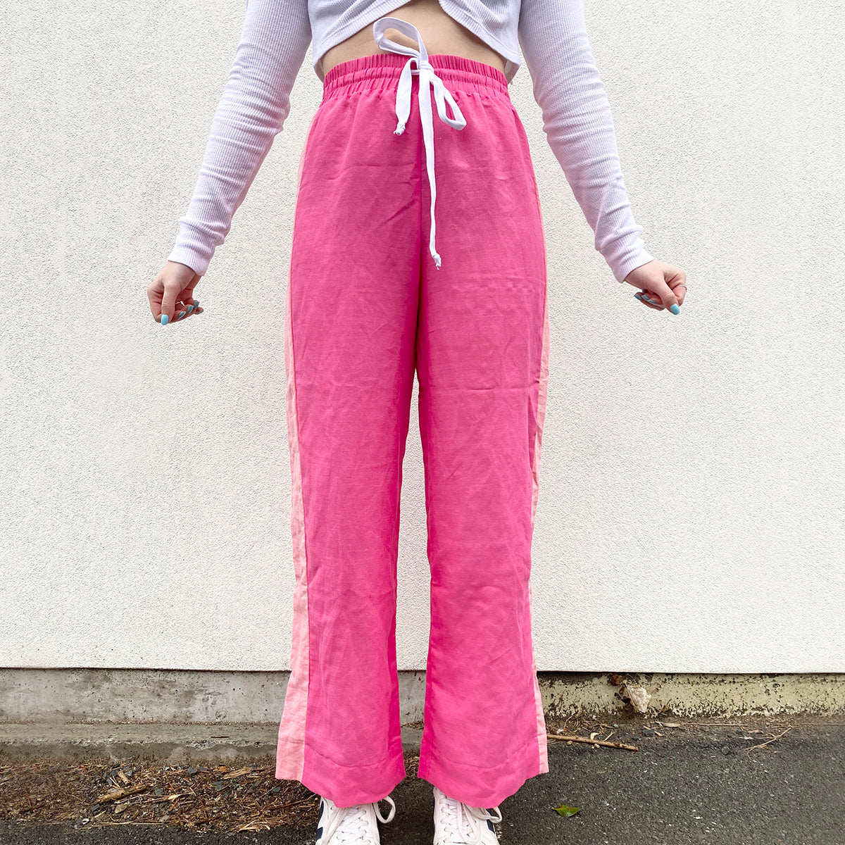 Stella Claire linen wide leg pants with a pink stripe down the sides. New Zealand made.