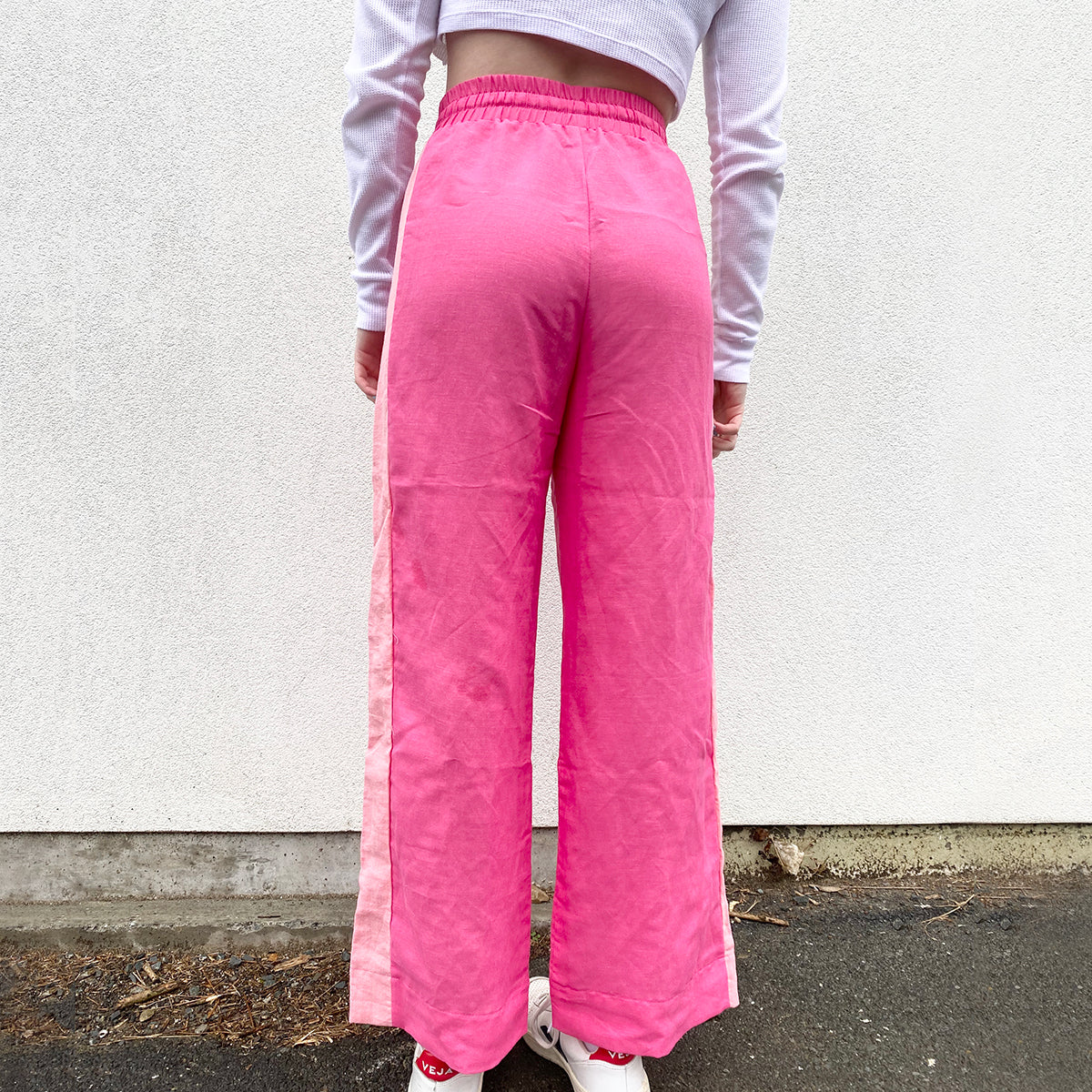 Stella Claire linen wide leg pants with a pink stripe down the sides. New Zealand made.