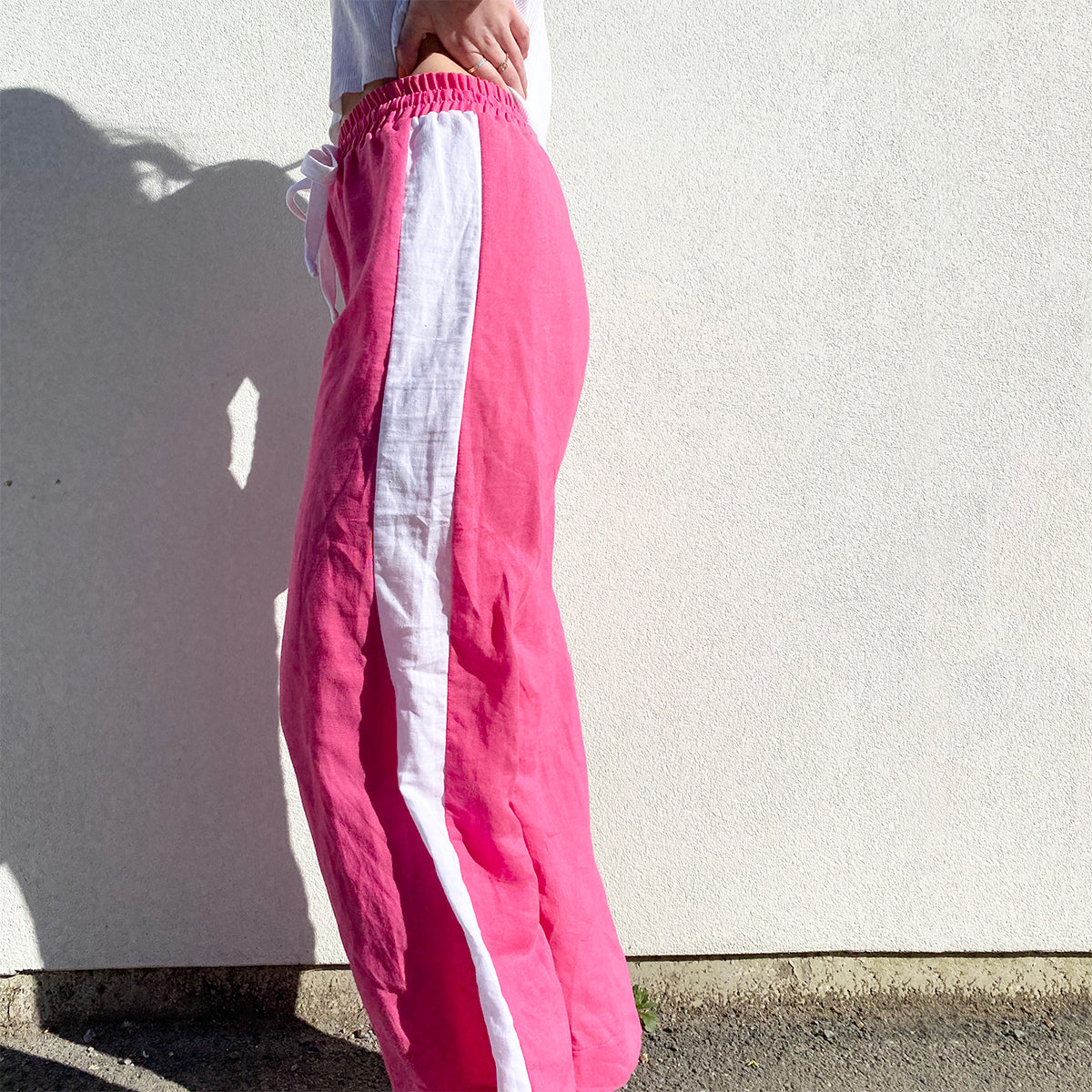 Stella Claire linen wide leg pants with a white stripe down the sides. New Zealand made.